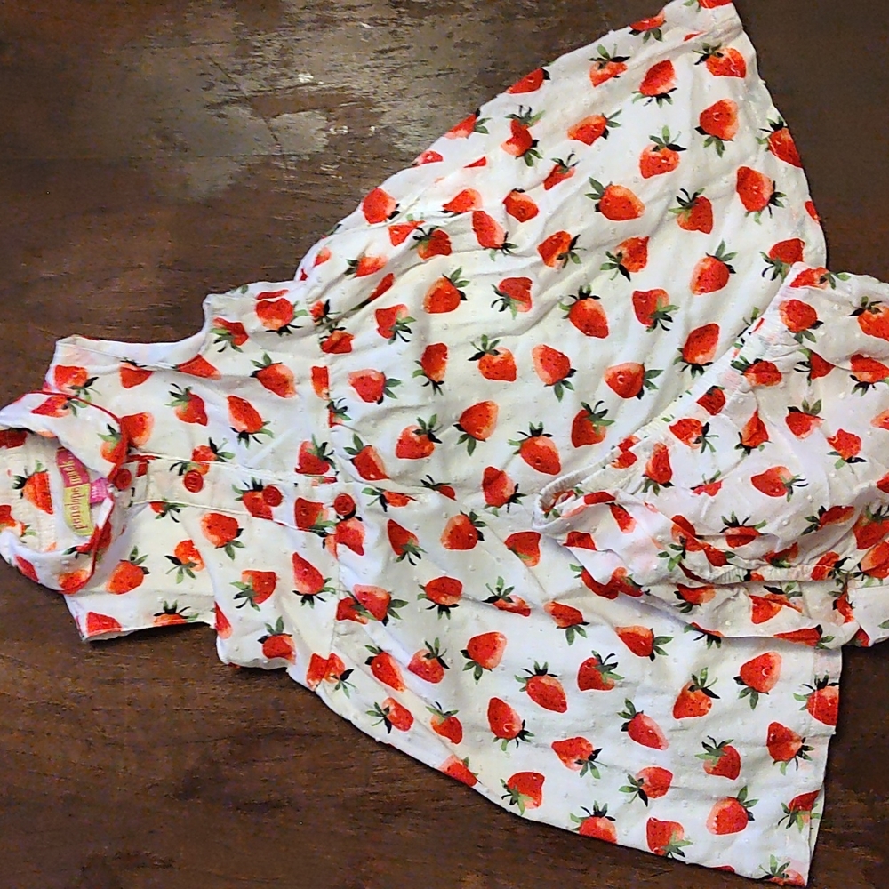 Penelope Mack, 18 months, white with strawberries